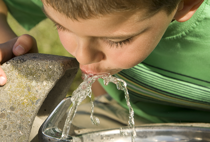 Boy drinking water